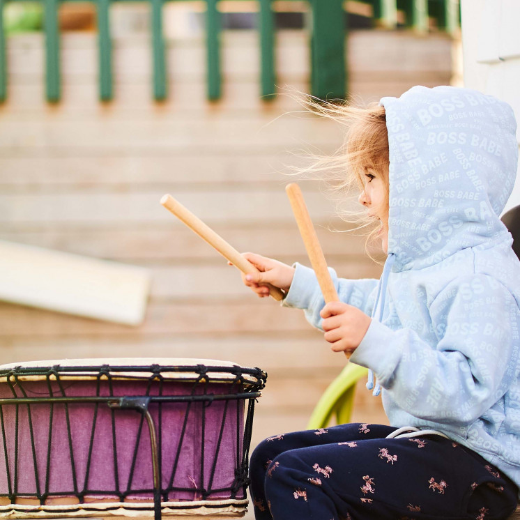 Beating to her own drum at Busy Bees Alfriston Road