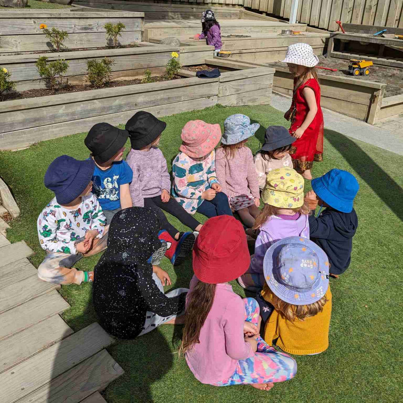 Preschool children playing outdoors 