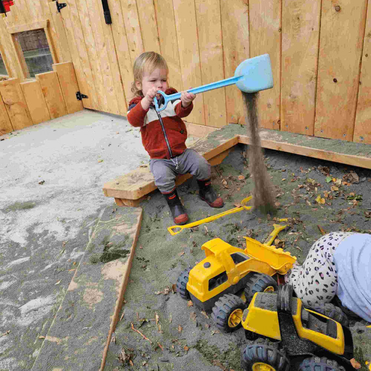 Sand pit fun at Busy Bees Carterton toddler space