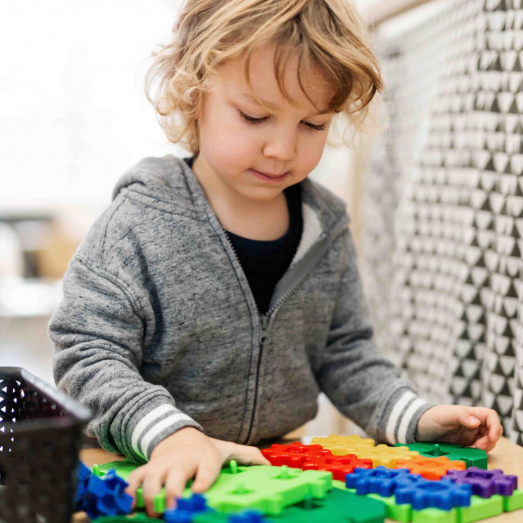 Preschool boy playing inside of early childhood centre in Palmerston North at Busy Bees on Church Street
