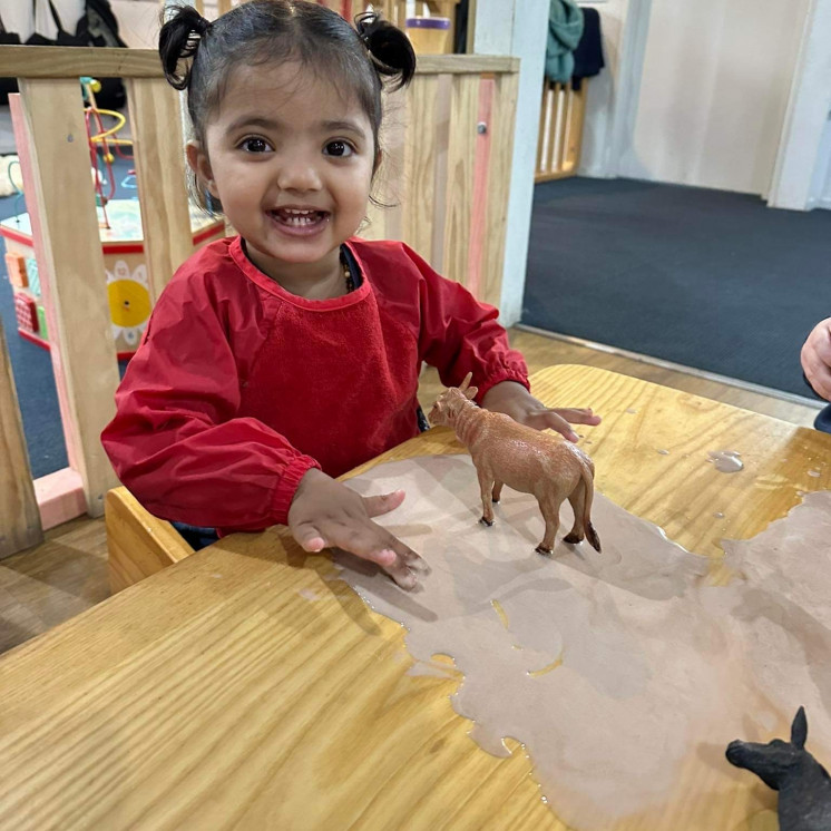 Toddler girl happy at Busy Bees Katikati