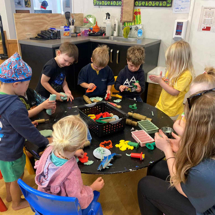 Teamwork in the preschool room at Busy Bees Mapua