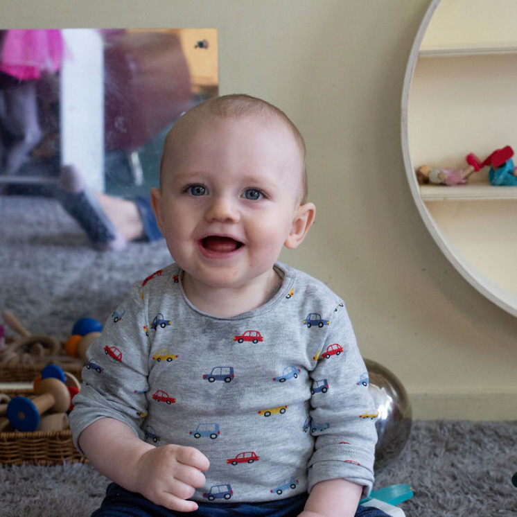 Happy infant at Busy Bees Morrinsville