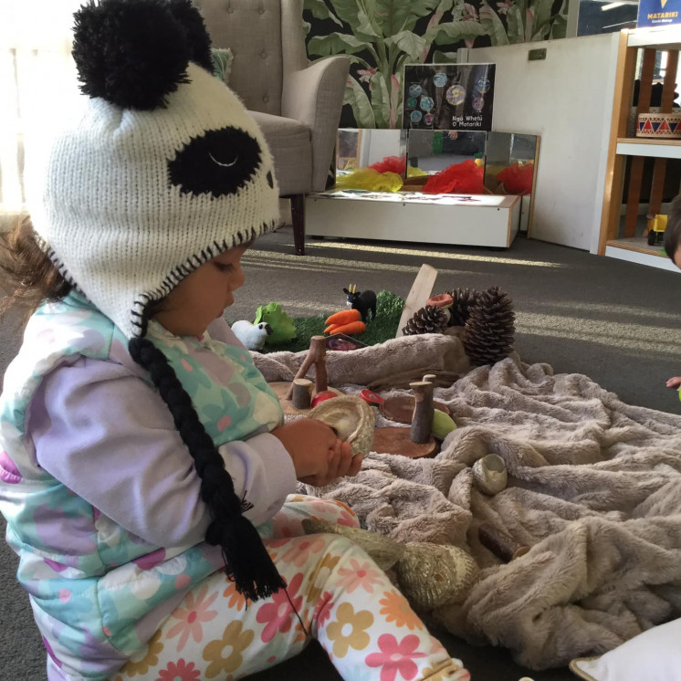 Busy Bees Motueka baby concentrating