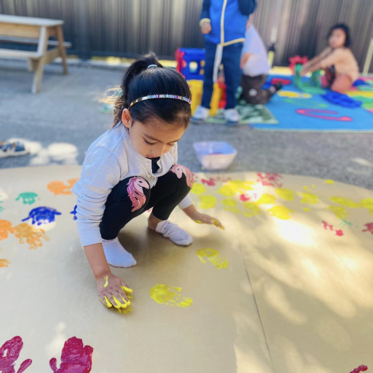 Teachers set up creative and colourful activities for children at Busy Bees Mount Wellington