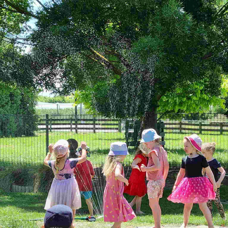 Sprinkler fun in the sunshine at Busy Bees Napier Road