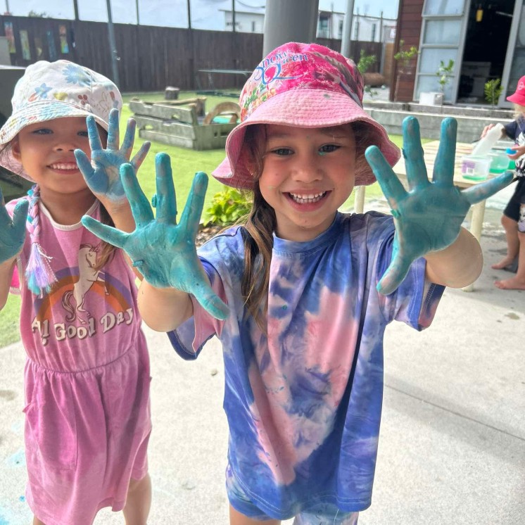 Messy hands at Busy Bees Papamoa Beach