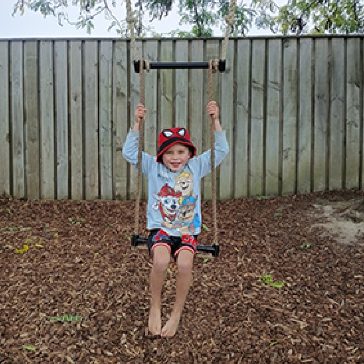 Happy Child swing fun outdoor childcare