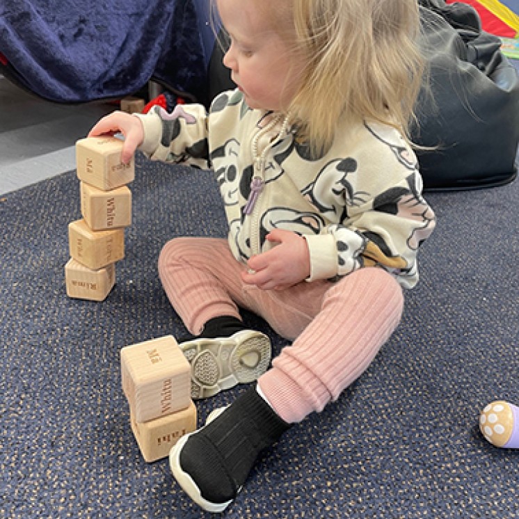 Little girl playing with blocks at Busy Bees Southbrook