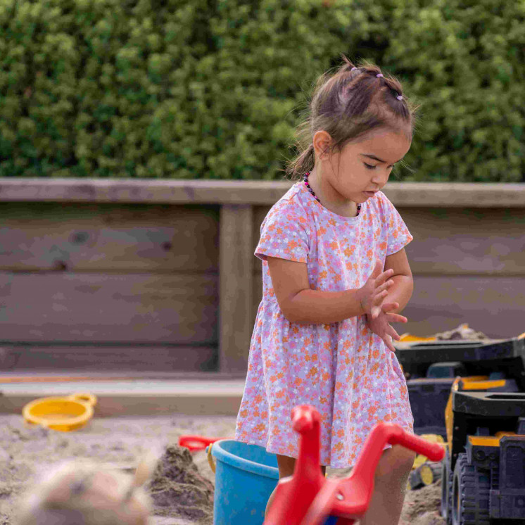Building and creating in the sandpit at Busy Bees Stoke centre in nelson