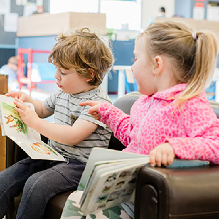 Reading with friends at Busy Bees Waitara
