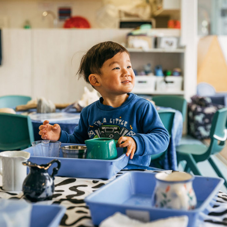 playing with kitchen Essentials at Harewood Road Montessori by Busy Bees